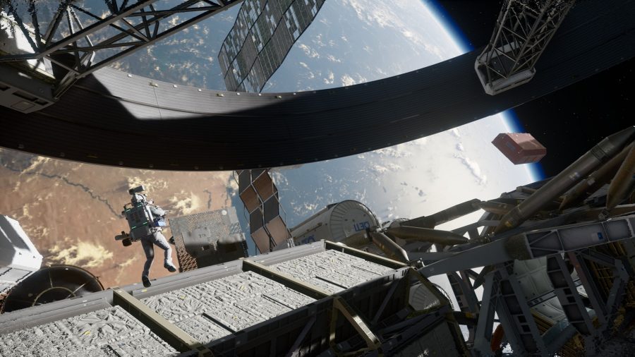 小さな宇宙飛行士が巨大な宇宙ステーションの隣に浮かんでいます