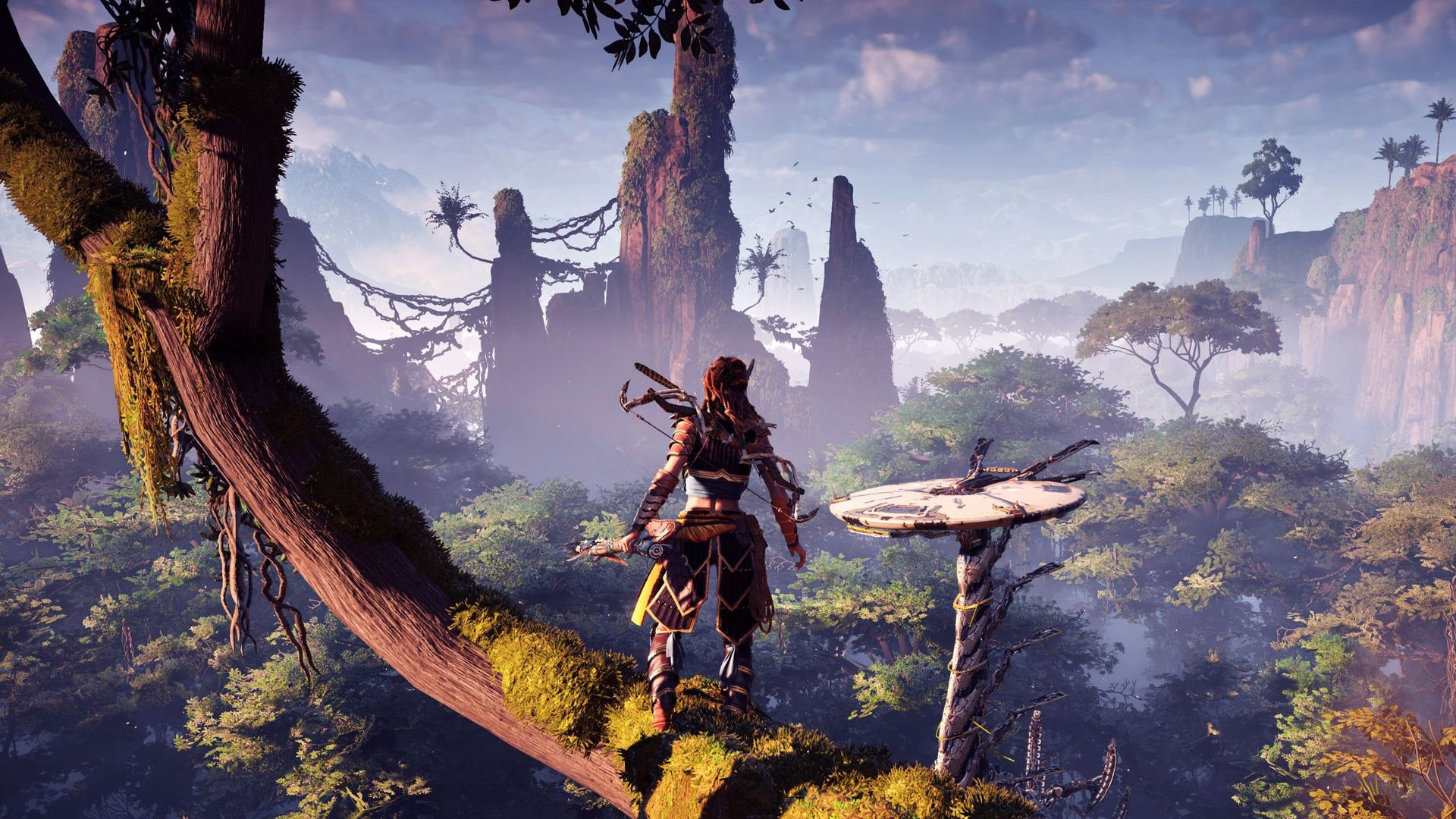 PS5オープンワールドゲーム：アロイは地平線を見下ろす木の上に立っています
