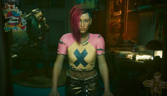 サイバーパンク 2077 ファントム リバティ DLC: ピンクと黄色のトップスを着た女性が鏡を覗き込む