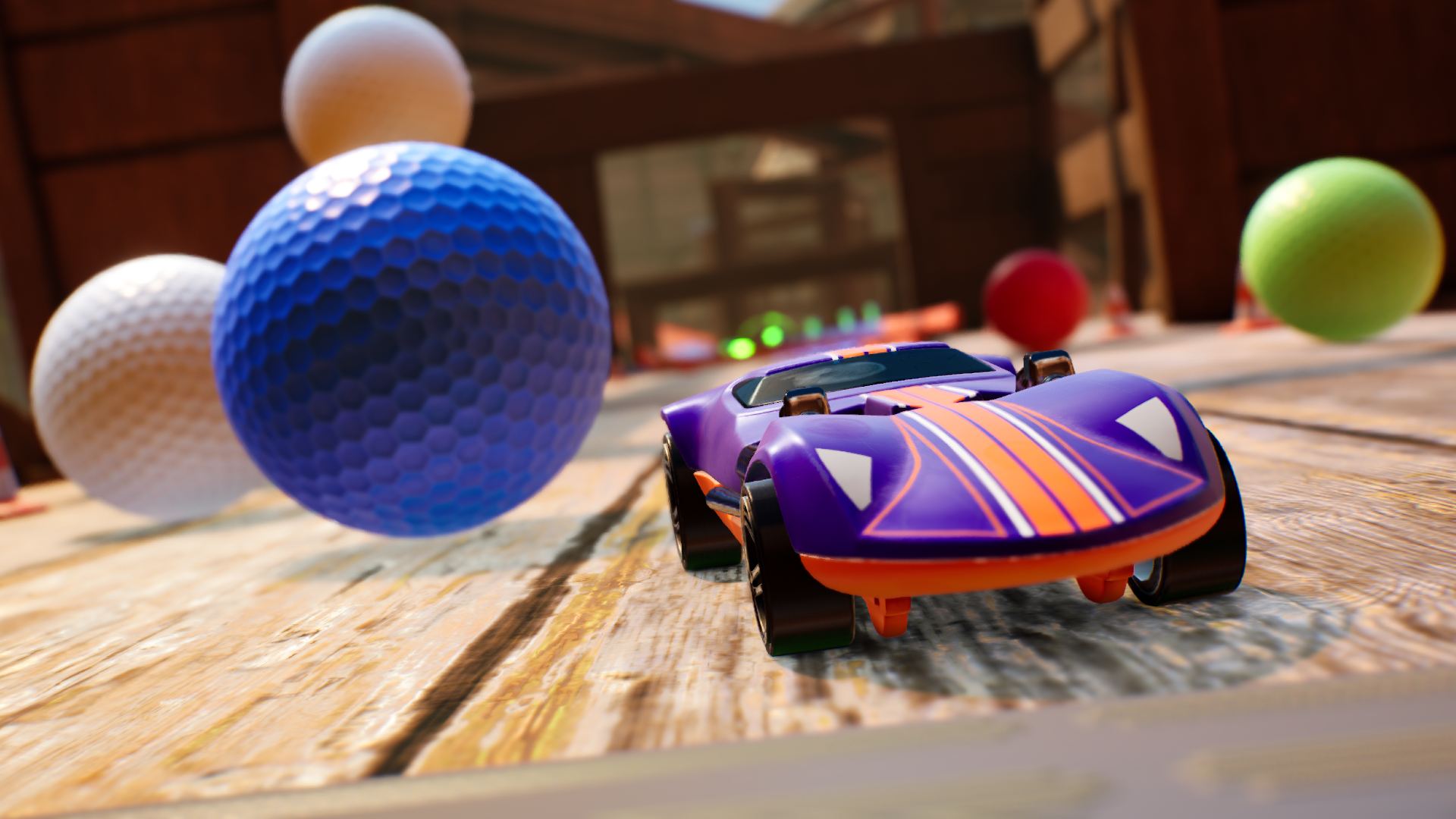 Hot Wheel Unleashed 2 ゲームプレイ プレビュー: 車がいくつかのボールを避けているのが見られます