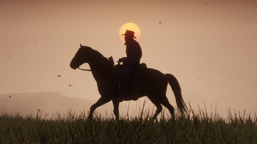 ベスト PS4 ゲーム: レッド デッド リデンプション 2 で夕日の前で馬に乗るカウボーイ