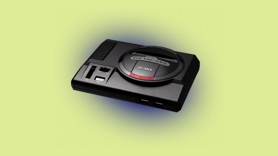 最高のレトロゲームコンソール: Sega Genesis Mini。 画像はコンソールがわずかに青く光っていることを示しています。